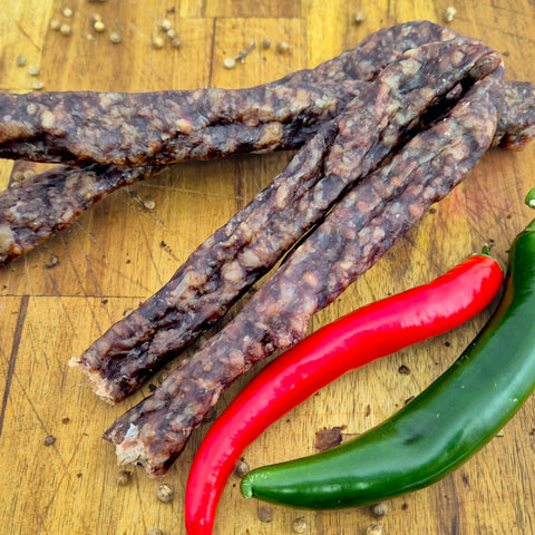Dry wors with a green and red chili